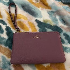 I’m selling a coach wristlet.